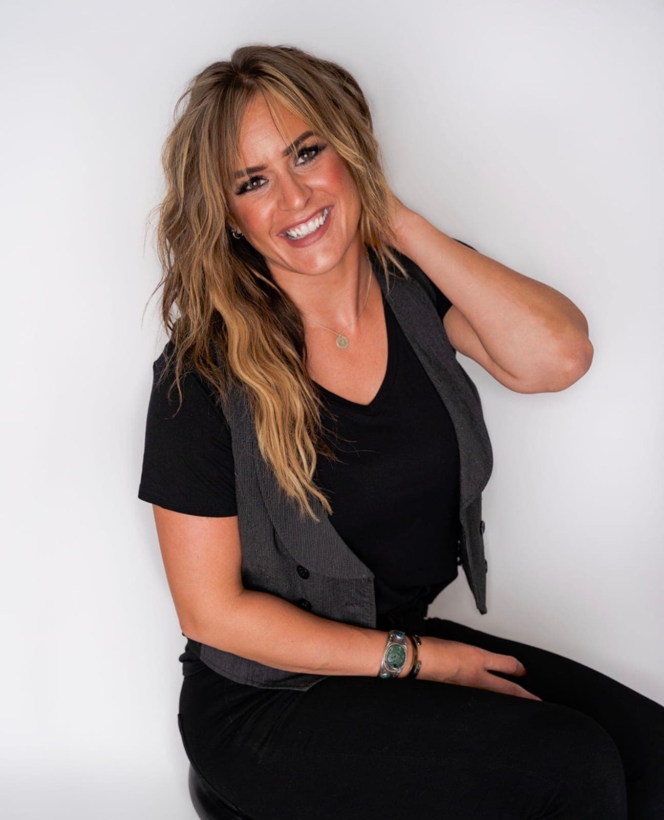 Warm color studio portrait of Alisa Sampson